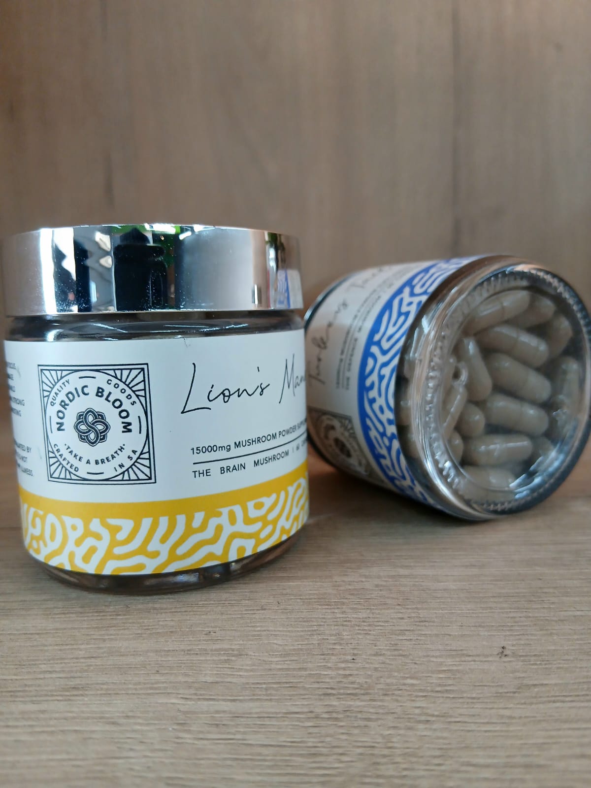 Nordic Bloom Lion's Mane mushroom powder supplement jars