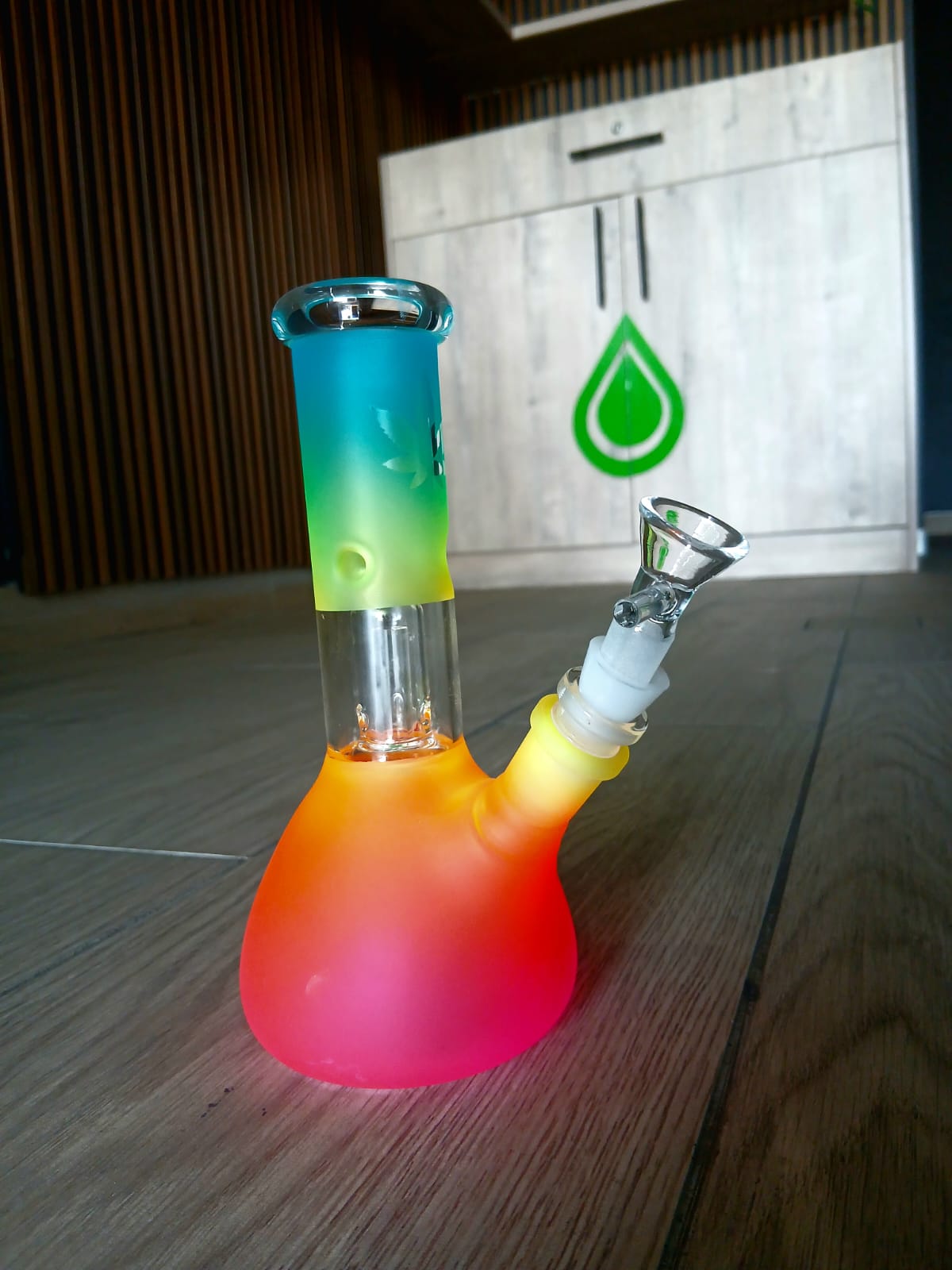 Rainbow frosted glass beaker bong on the Cannafrica store counter