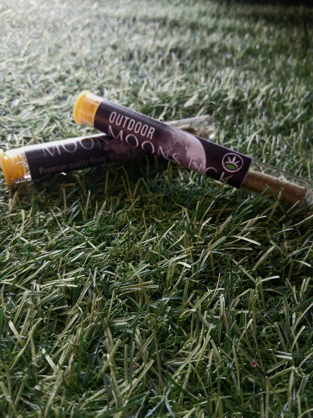 Outdoor Moonstick premium pre-roll on turf